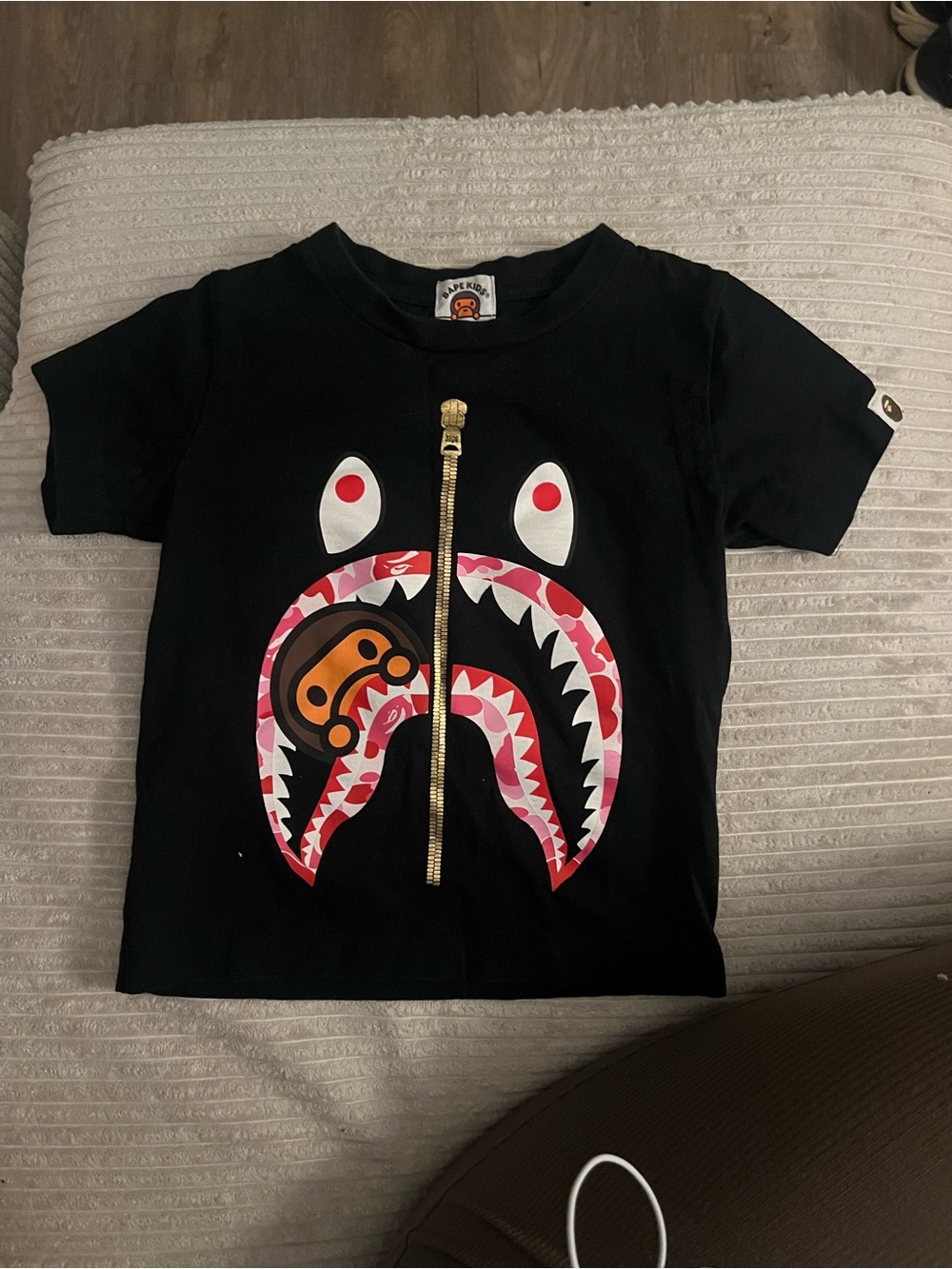 Bape Kids Black Tee with Pink Camo Shark Face and Gold Zipper